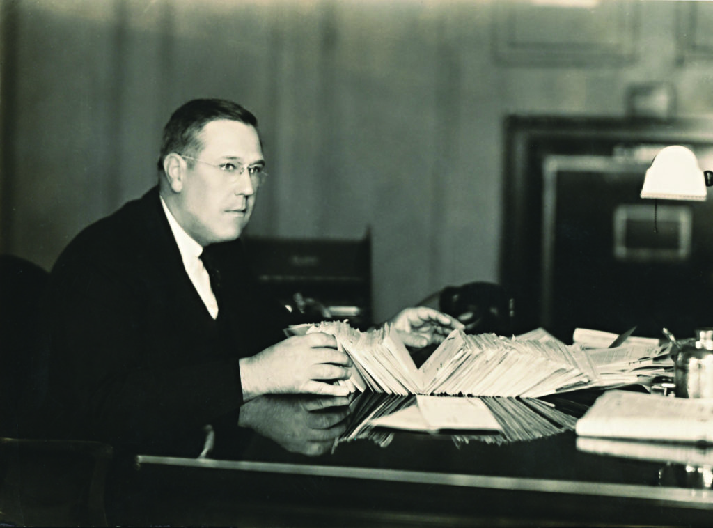 EJ Brookhart, Celina Insurance Group, working at a desk