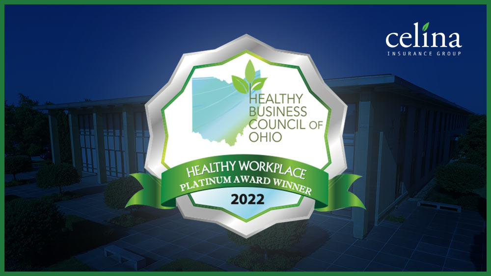 Celina Insurance Group building in the background with the logo for the 2022 Healthy Worksite Platinum Award superimposed on it.