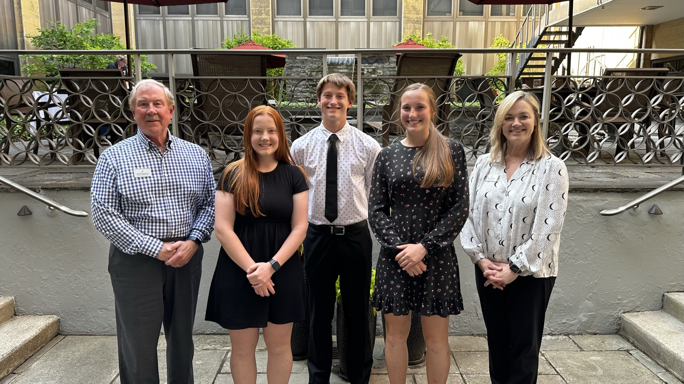 Bill Montgomery, Celina President and CEO, left, and Suzanne Wells, Celina Director of Internal Audit and Corporate Secretary, right, stand with this year’s scholarship recipients. The recipients are pictured left to right: Kennedy Voskuhl, Ray Purdy and Jenna Leugers.